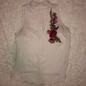 White top with embroidered flowers